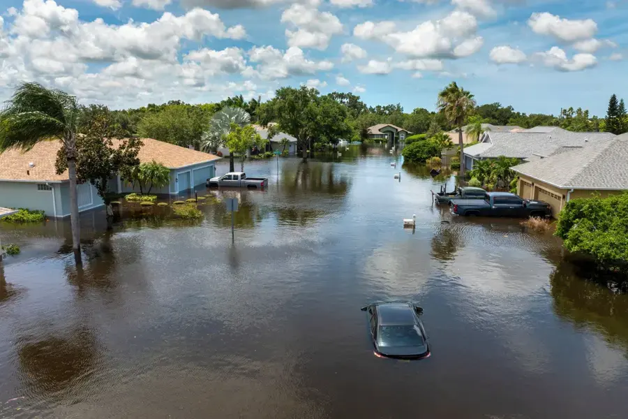 Flooded Southwest Florida neighborhood street after a hurricane